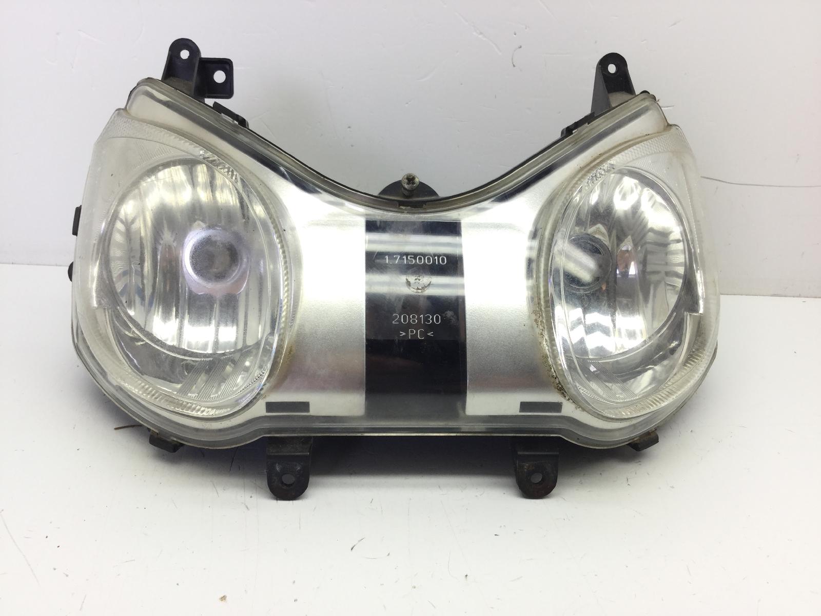 Piaggio carnaby 125 faro fanale anteriore con due attacchi rotti 2007 2010 m60200