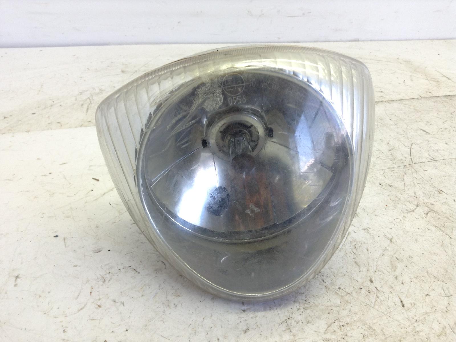 Piaggio liberty 4t 2v euro 3 125 faro fanale anteriore -graffiato e crepe 2009 2012 m67100