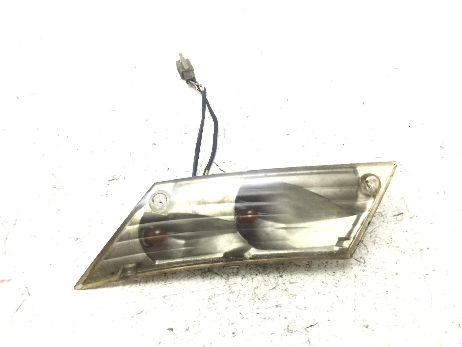 Piaggio zip 2t 50 freccia posteriore sinistra - vetro ingiallito 2000 2004 c25000