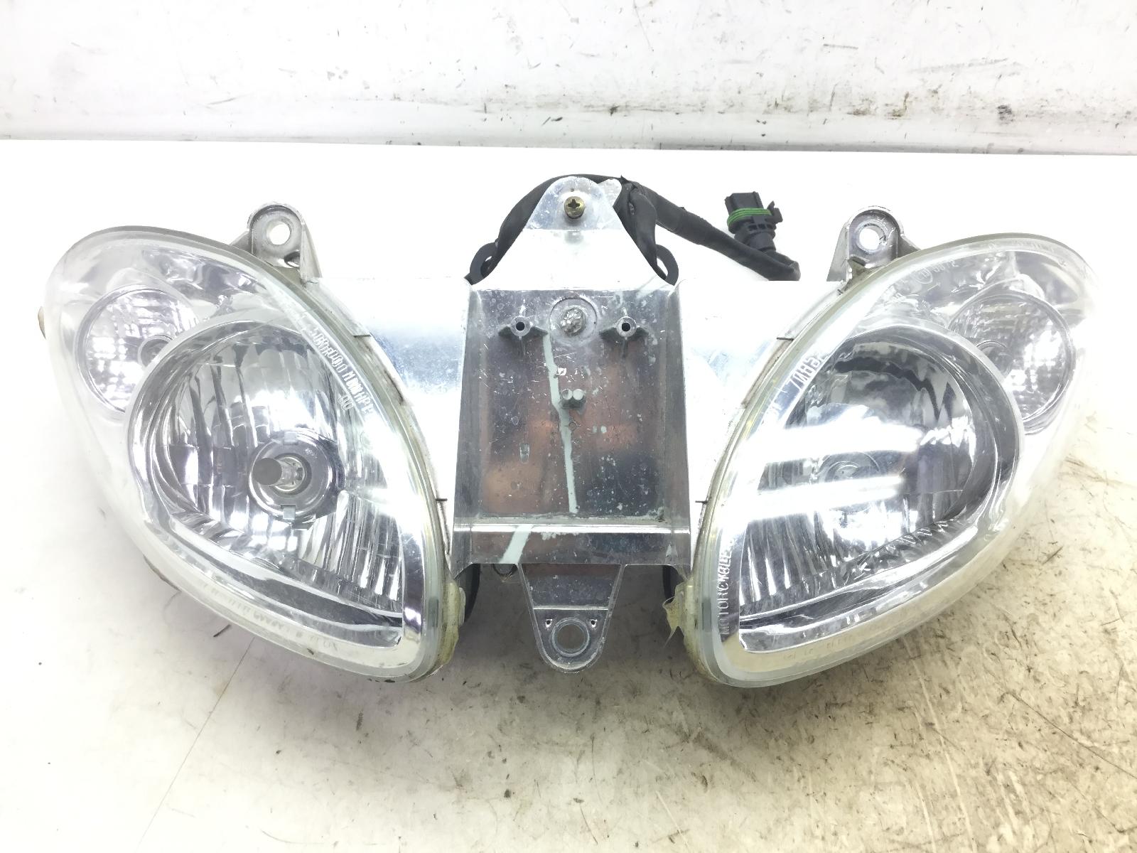 Piaggio x9 evolution 250 faro fanale anteriore con lievi graffi 2006 2006 m23000045