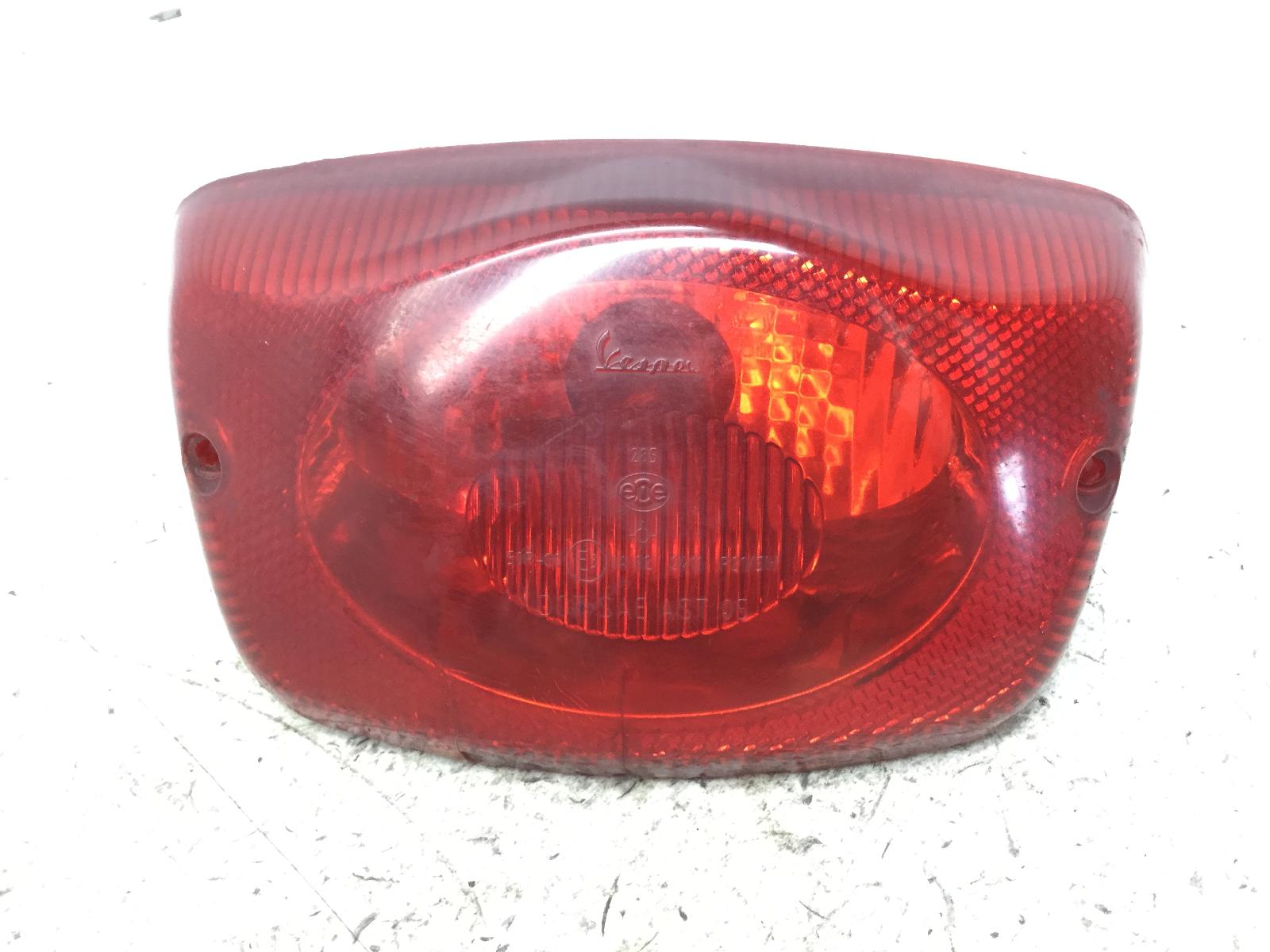 Piaggio vespa lx e3 125 faro fanale posteriore gemma con crepe 2006 2008 m44300